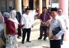 Desil Berubah, Camat Sawangan Pantau Penyaluran Bansos di Kelurahan Cinangka